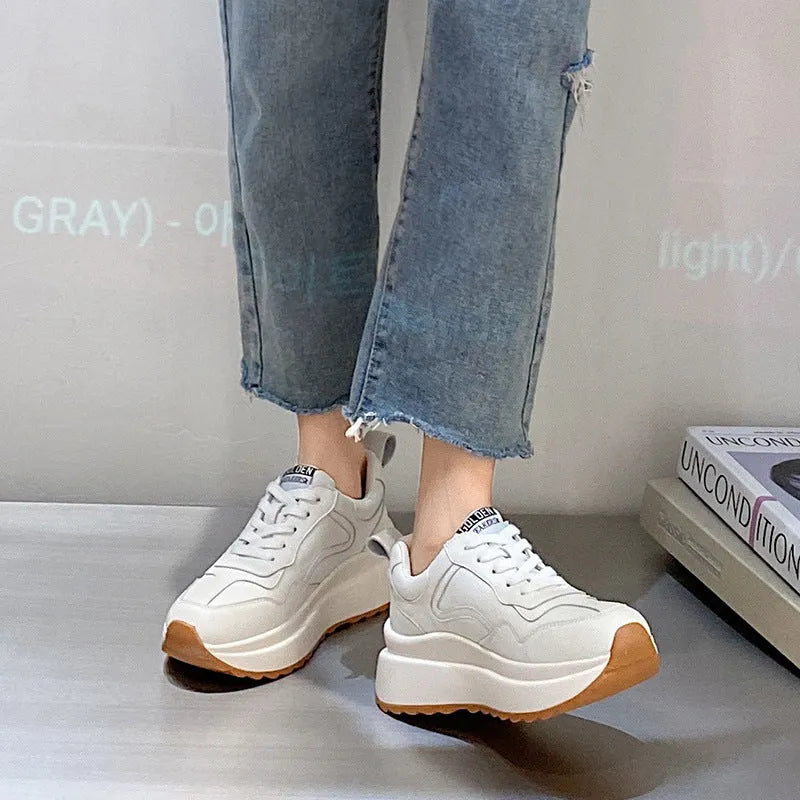Beige women's low-top casual sports shoes made of cowhide leather with a cross-strap and English muffin heel.