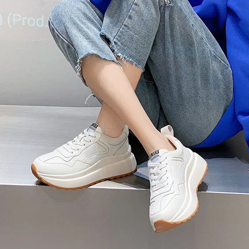 Beige women's low-top casual sports shoes made of cowhide leather with a cross-strap and English muffin heel.