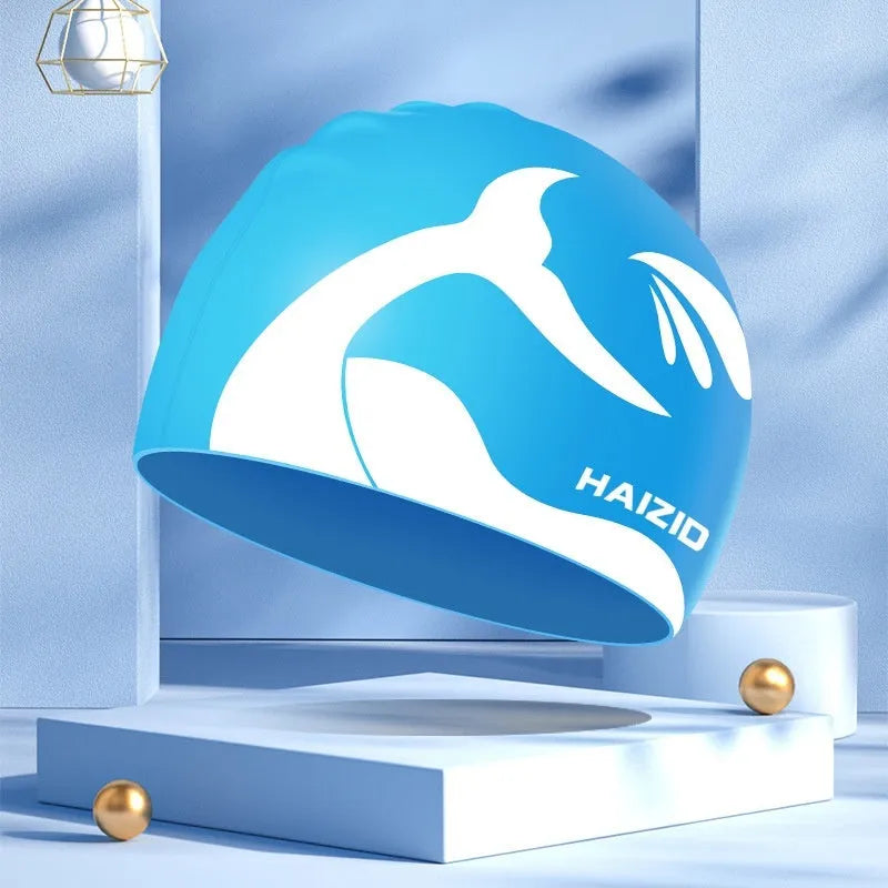 Silicone swimming cap with whale tail pattern and waterproof ear protectors in multiple colour options