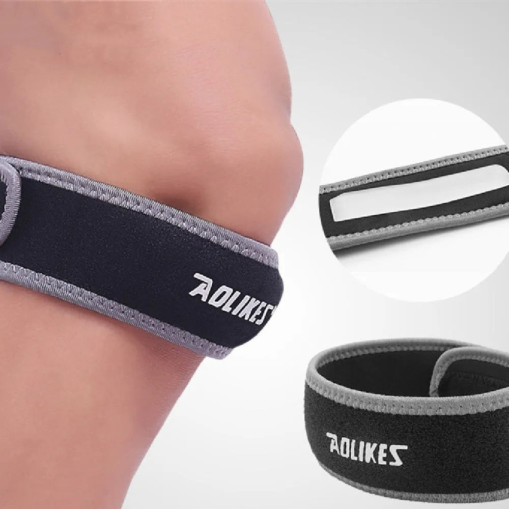 Black and grey patella retinaculum knee support strap for running, cycling and sports