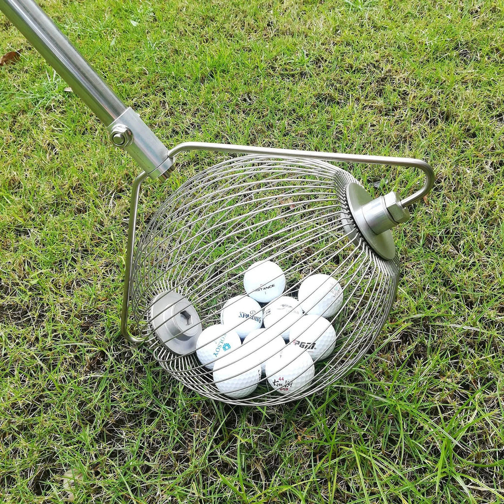 Metallic coloured stainless steel golf ball picker tool on a driving range turf.