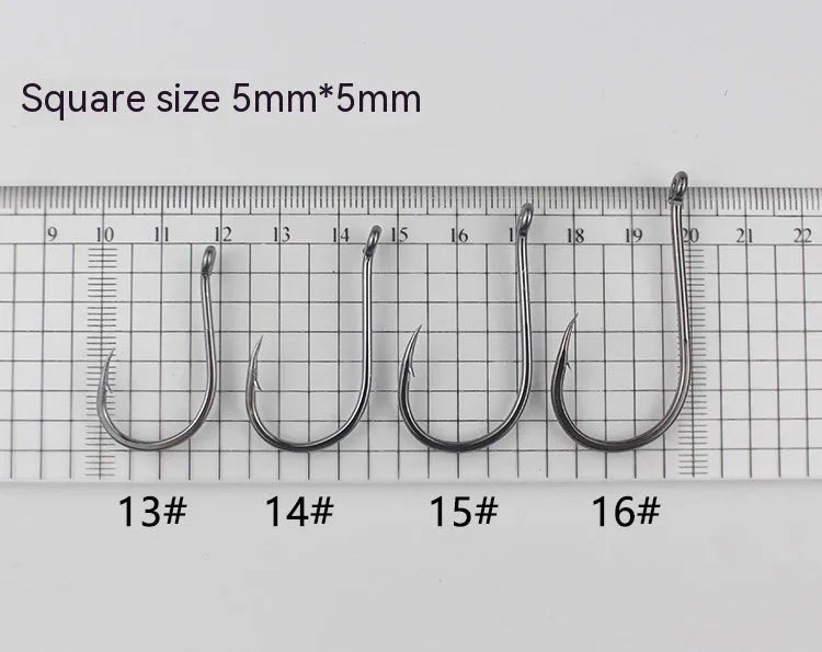 Bulk pack of barbed alloy carbon steel fishing hooks with hole rings for sea fishing