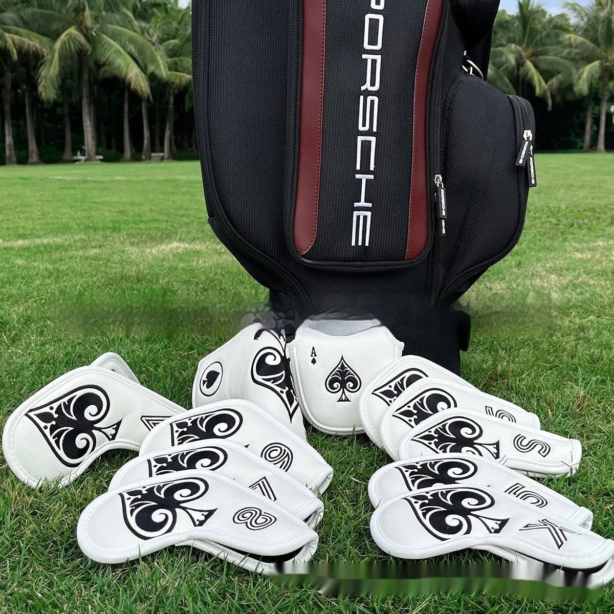 A black PU golf club sleeve designed to cover and protect a putter head.