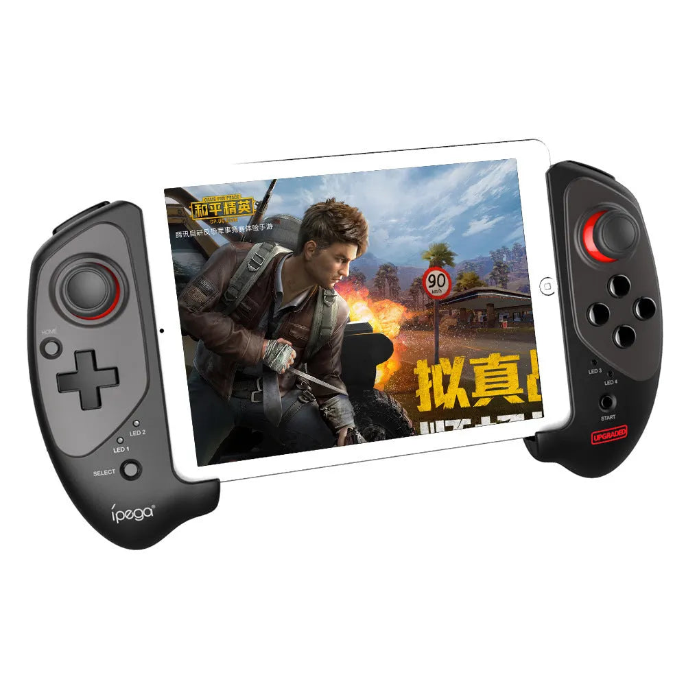 Red telescopic Bluetooth gamepad controller for Android, iOS, and PC on a table.
