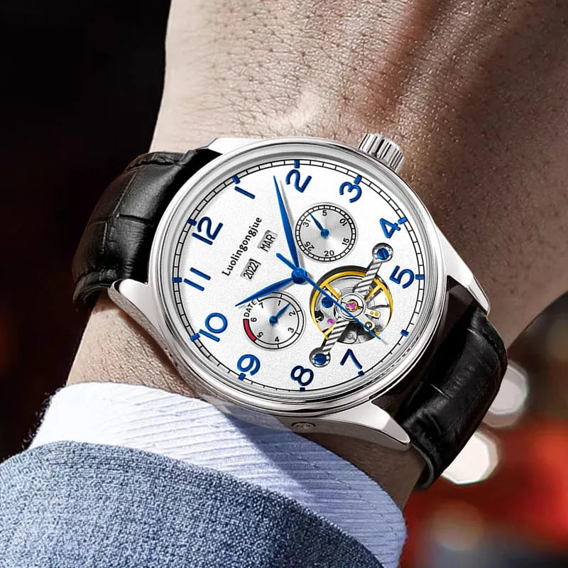 Men's stainless steel business watch with skeleton mechanical movement and black leather strap