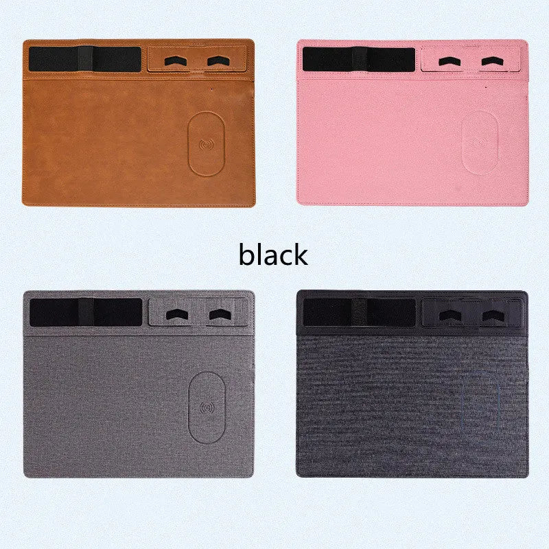 Pink wireless charging mouse pad with phone holder on a desk, showing USB cable and 320x260mm size.