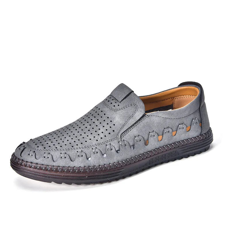 Men's brown slip-on casual shoes with round toe and flat heel on a white background