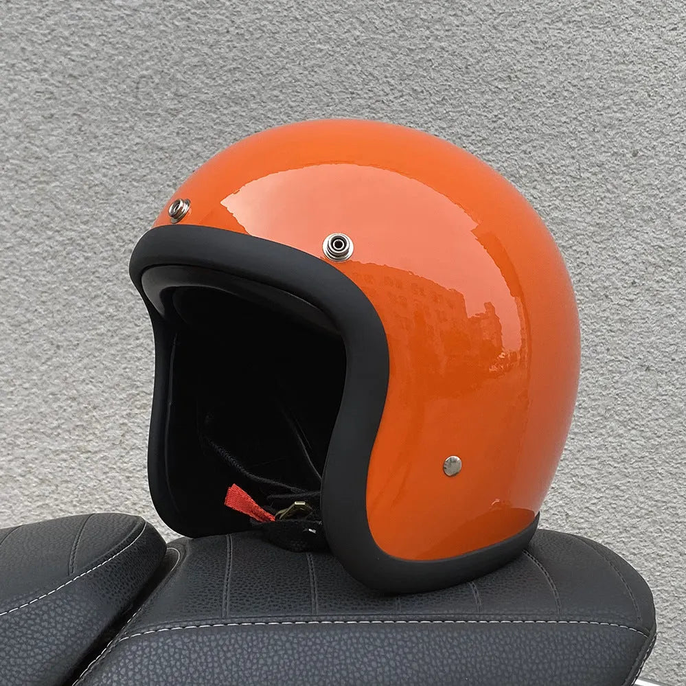 Retro-style half motorcycle helmet in fibreglass, shown in a cement grey colour option.