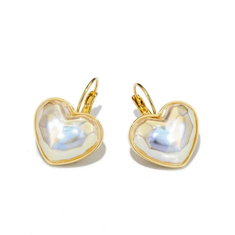 Gold women's ear clip with summer love design and clip-on fastening