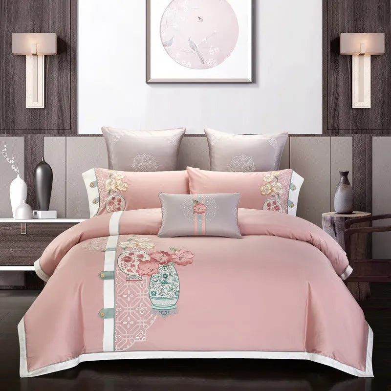 Cotton embroidery bedding set showing satin weave texture and embroidery pattern detail