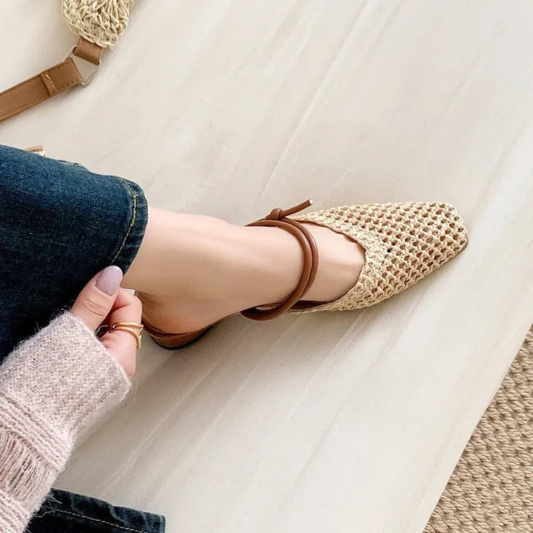 Women's black square toe slippers with hollow-out design and a thick chunky heel