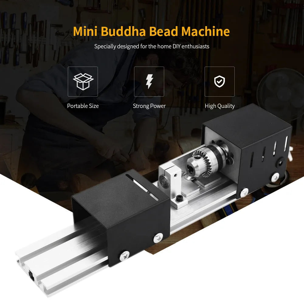 Mini metal woodworking lathe with silver finish and carving accessories on workbench