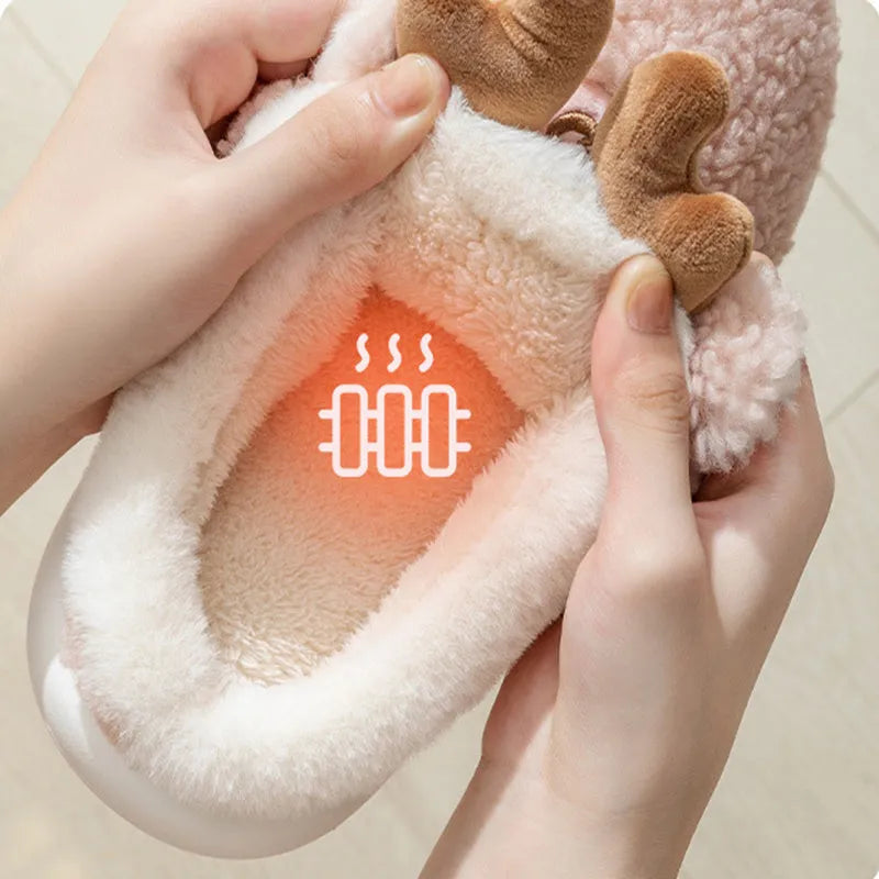 Christmas winter home slippers with suede upper and EVA sole in antler pink colour