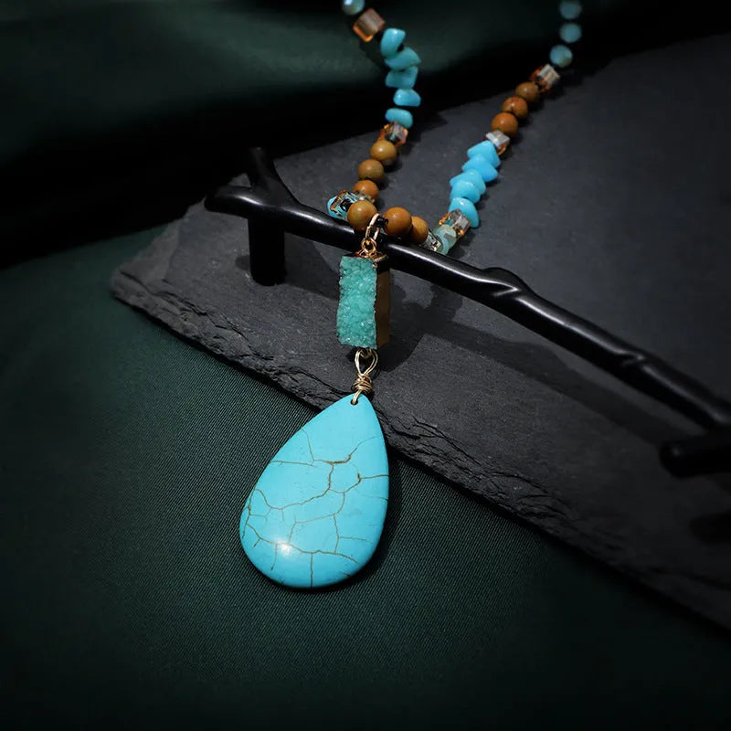 Blue turquoise pendant necklace with mixed gem inlay drop design on ball bead chain