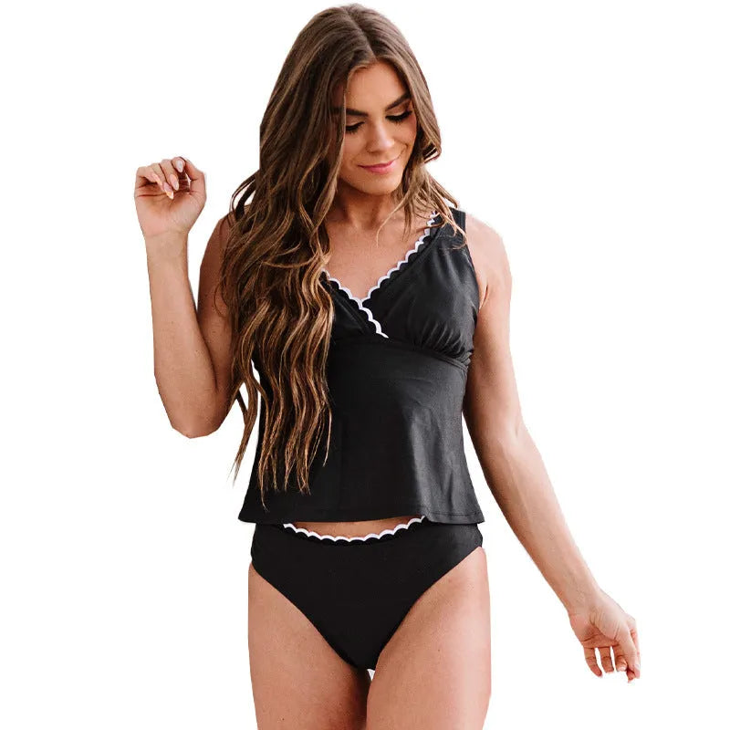 Black sleeveless one-piece women's swimsuit on a hanger