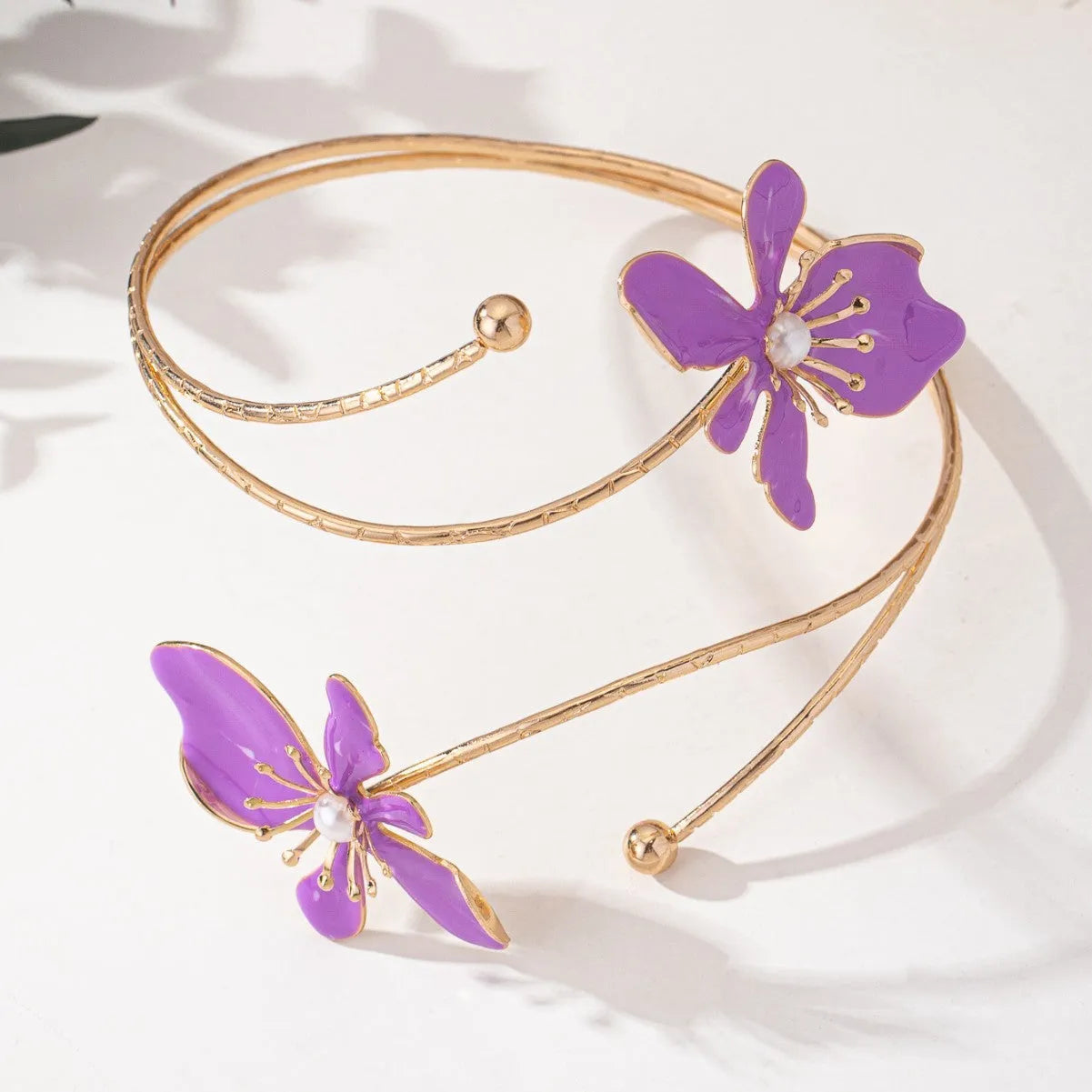 Adjustable alloy armband with hollow pattern design in pink or purple colour