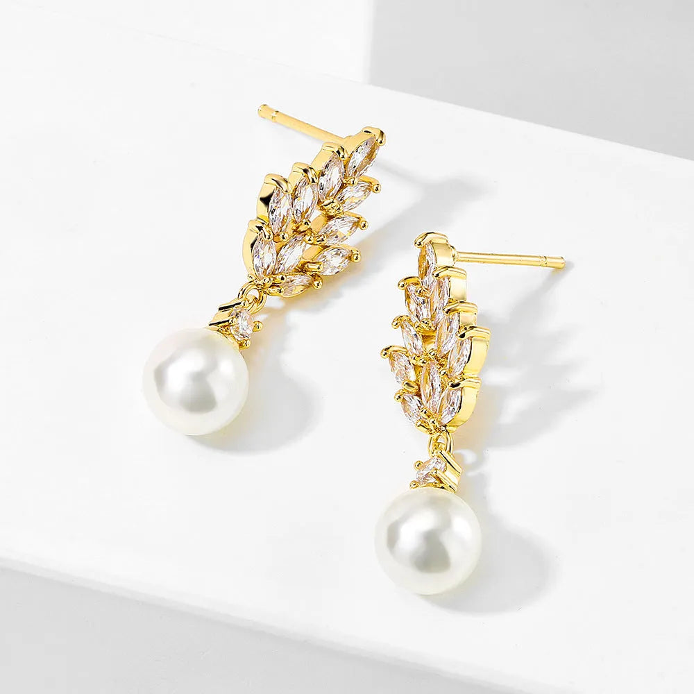 Geometric earrings with micro zircon stones and flower design in gold, platinum or rose gold plating