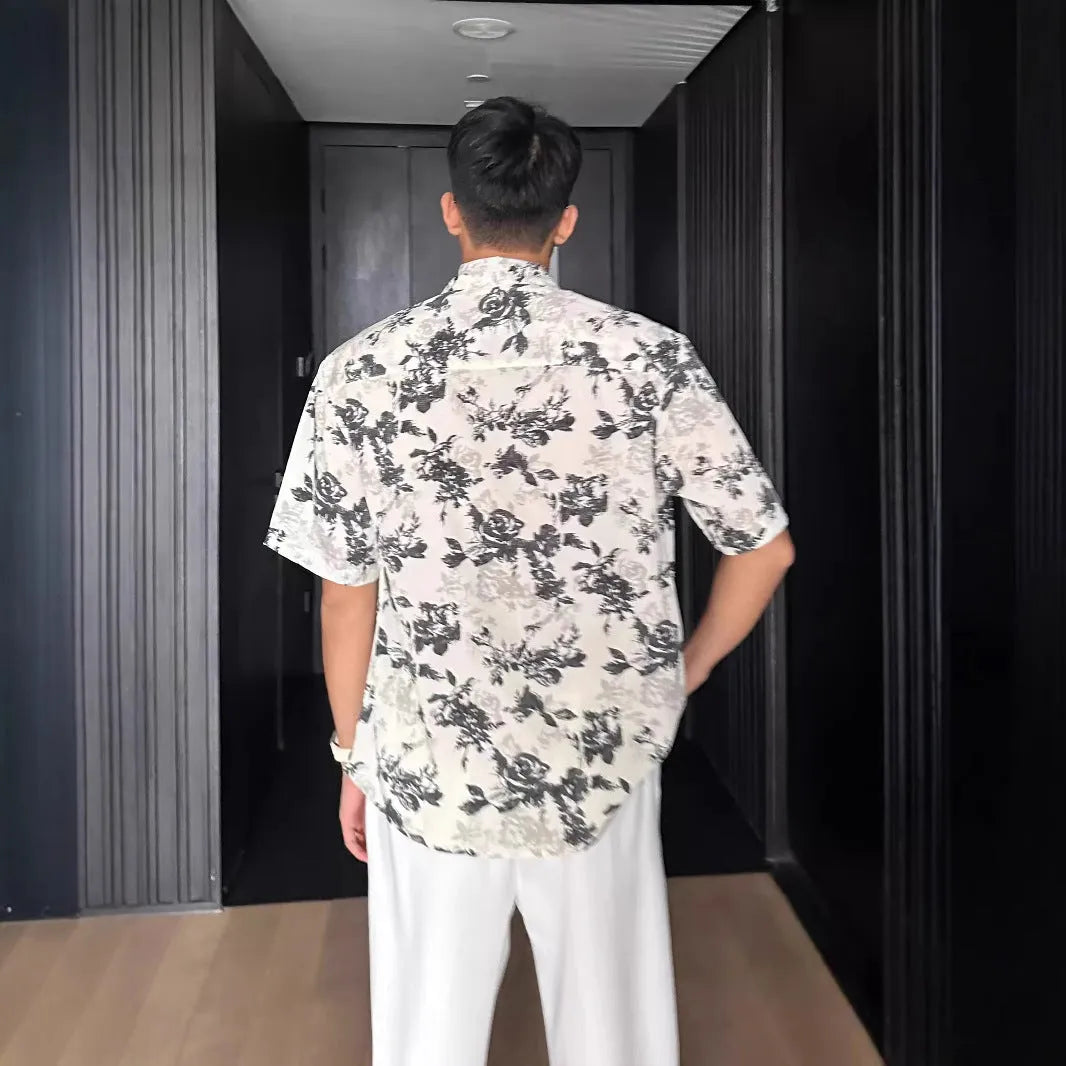 Short sleeve floral print shirt in black or white with loose casual fit