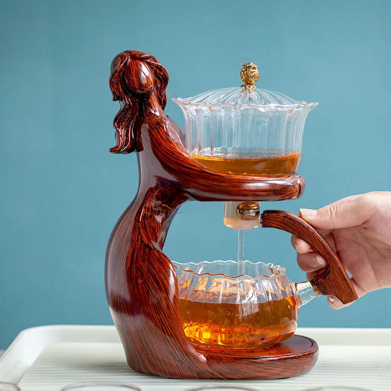 Maid semi-automatic tea set with borosilicate glass teapot, stainless steel filter, and Chinese-style woman sculpture base