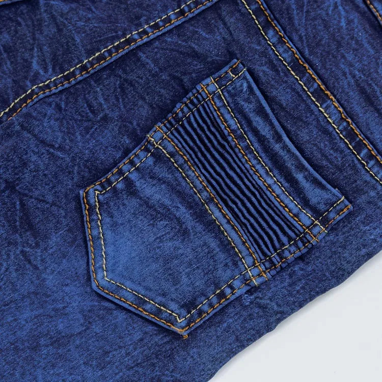 Boys' blue flat stretch slim long jeans on a child model