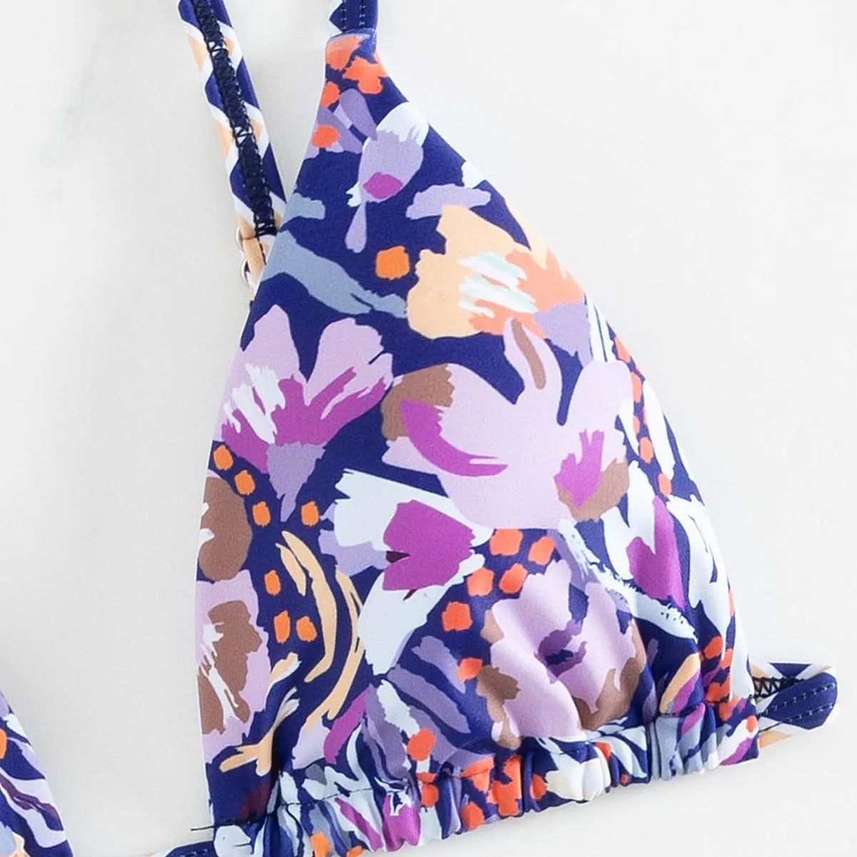 Women's floral printed swimsuit with triangle bag design in briefs style