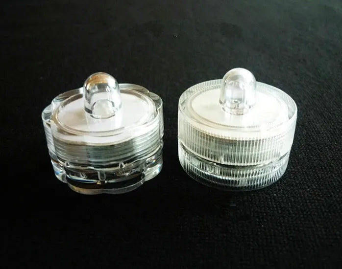 Set of colourful electronic candle lights with CR2032 battery, submersible, 3cm diameter, 2.6cm height, plastic housing