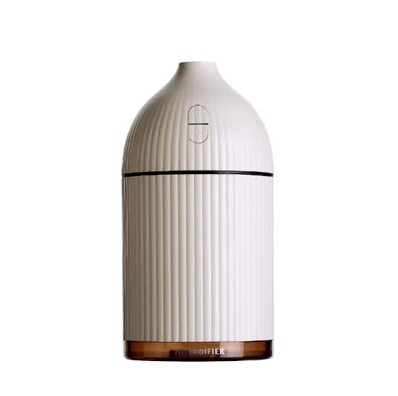 White ultrasonic essential oil diffuser and humidifier with LED light, 300ml capacity, USB cable.