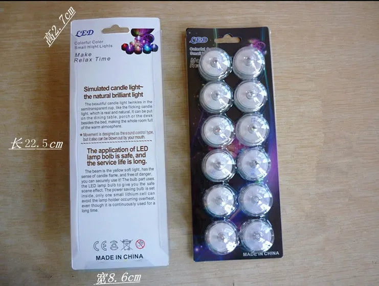 Set of colourful electronic candle lights with CR2032 battery, submersible, 3cm diameter, 2.6cm height, plastic housing