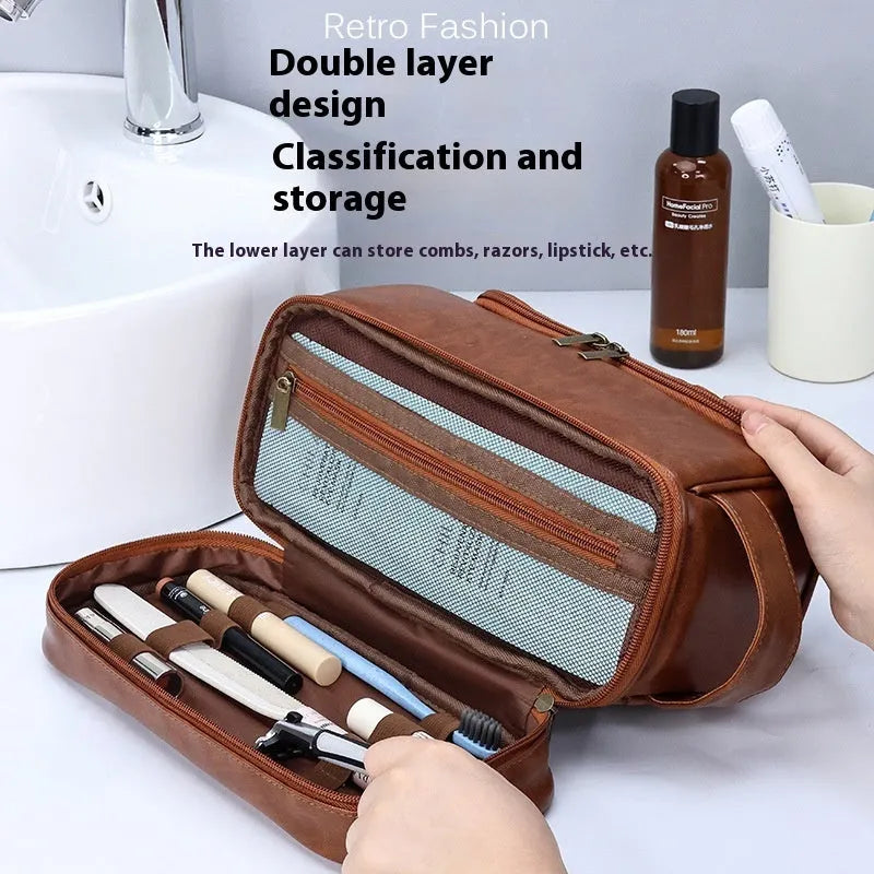 Leather travel toiletry bag in brown with hook, showing main compartment and portable design