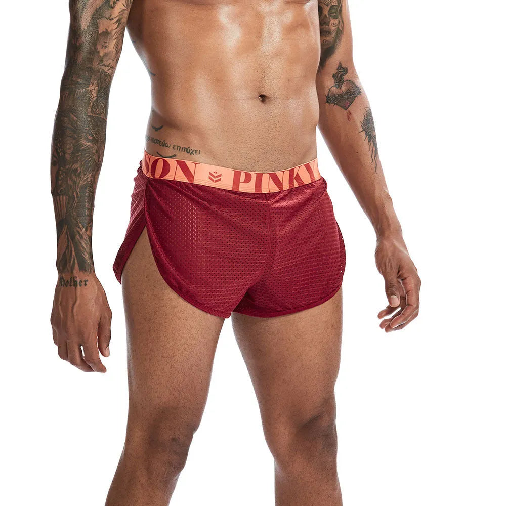 Men's solid colour nylon mesh boxer briefs on a white background showing mid-waist fit.