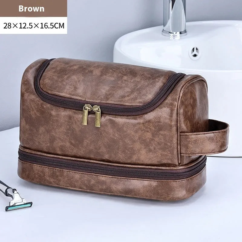 Leather travel toiletry bag in brown with hook, showing main compartment and portable design