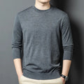 Men's round neck long sleeve wool blend sweater in caramel colour on a size chart background.
