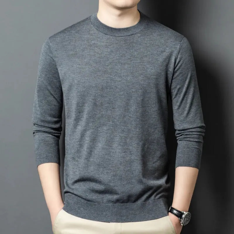 Men's round neck long sleeve wool blend sweater in caramel colour on a size chart background.