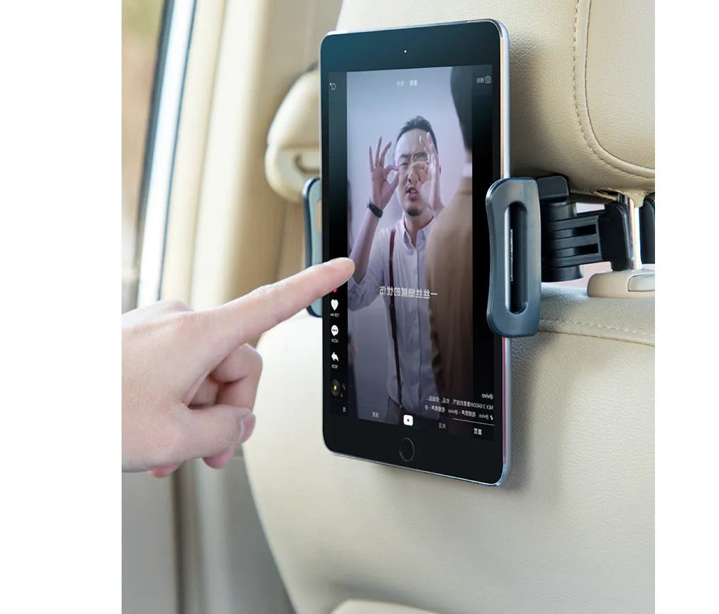 Black universal car phone and iPad holder mounted on a car seat headrest.