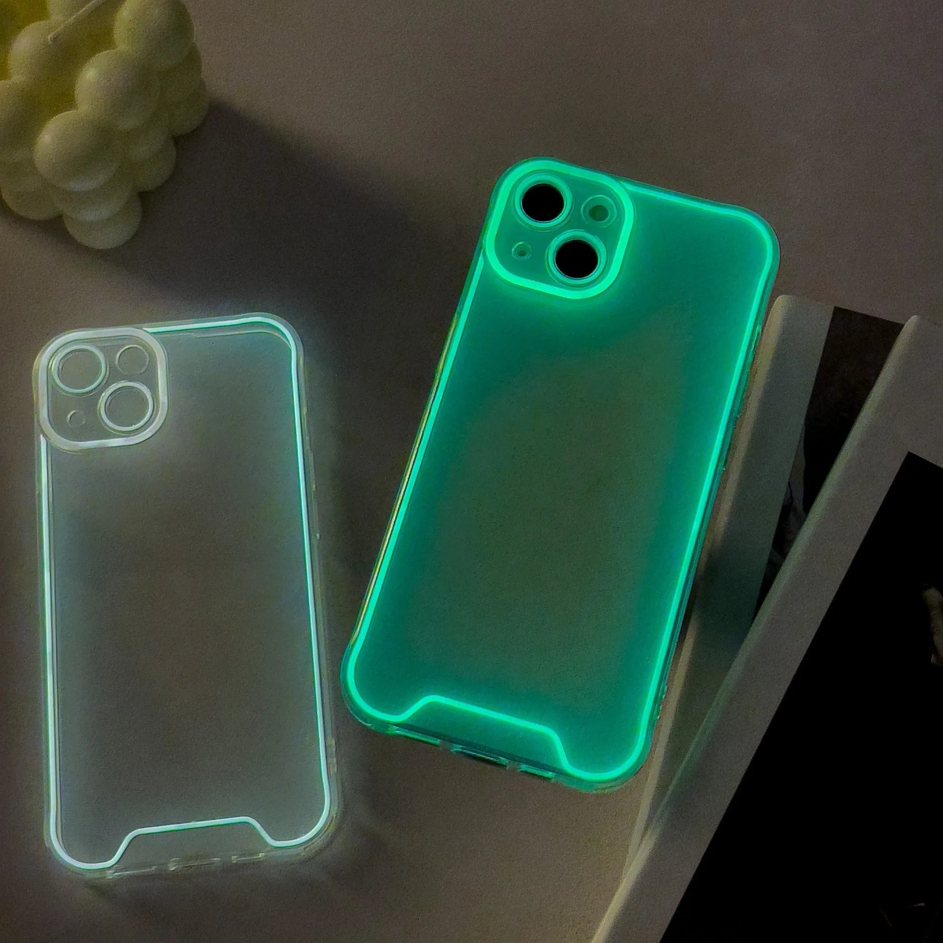 Soft TPU glow-in-the-dark Christmas phone case for iPhone showing blue colour variant on iPhone 14 Pro Max