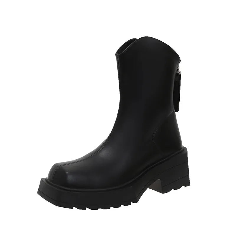 Black platform Martin boots for women with square toe and back zipper on a white background.