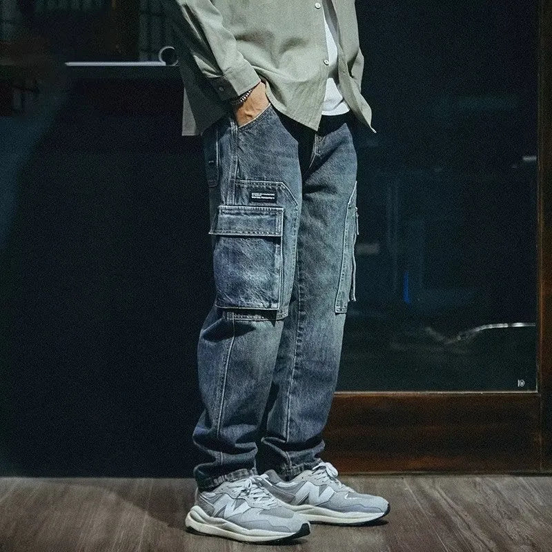Men's blue loose straight retro jeans with stretch denim fabric and zip fly closure