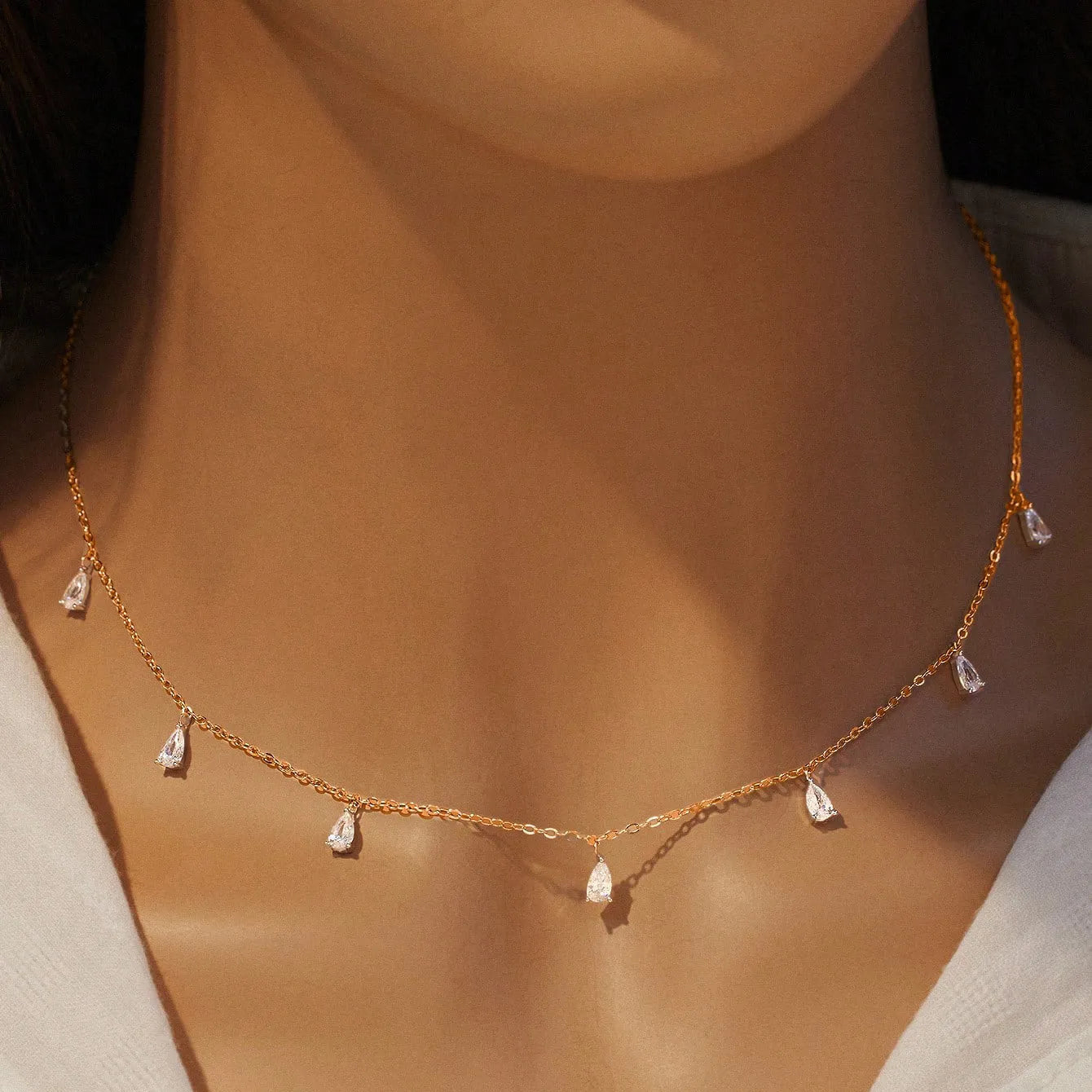 925 silver drop-shaped zircon pendant necklace on an adjustable O-chain in silver, rose gold, or golden yellow.