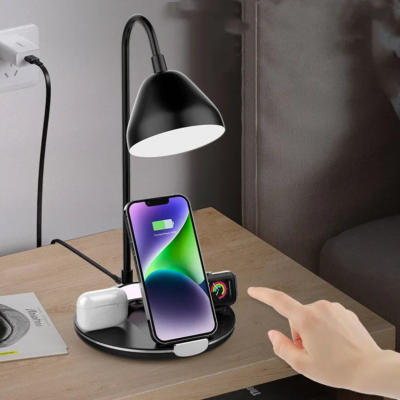 Black magnetic folding wireless charger unfolded showing phone, earbuds, and watch on charging pads