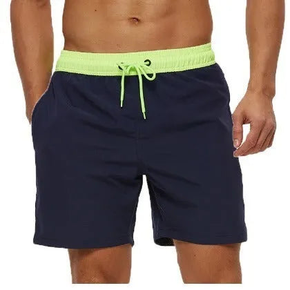 Men's blue athletic shorts with a stitching waistband, drawstring, and side headband pocket.