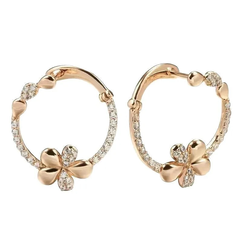 A pair of round geometric ring earrings for women with a copper base and electroplated finish.