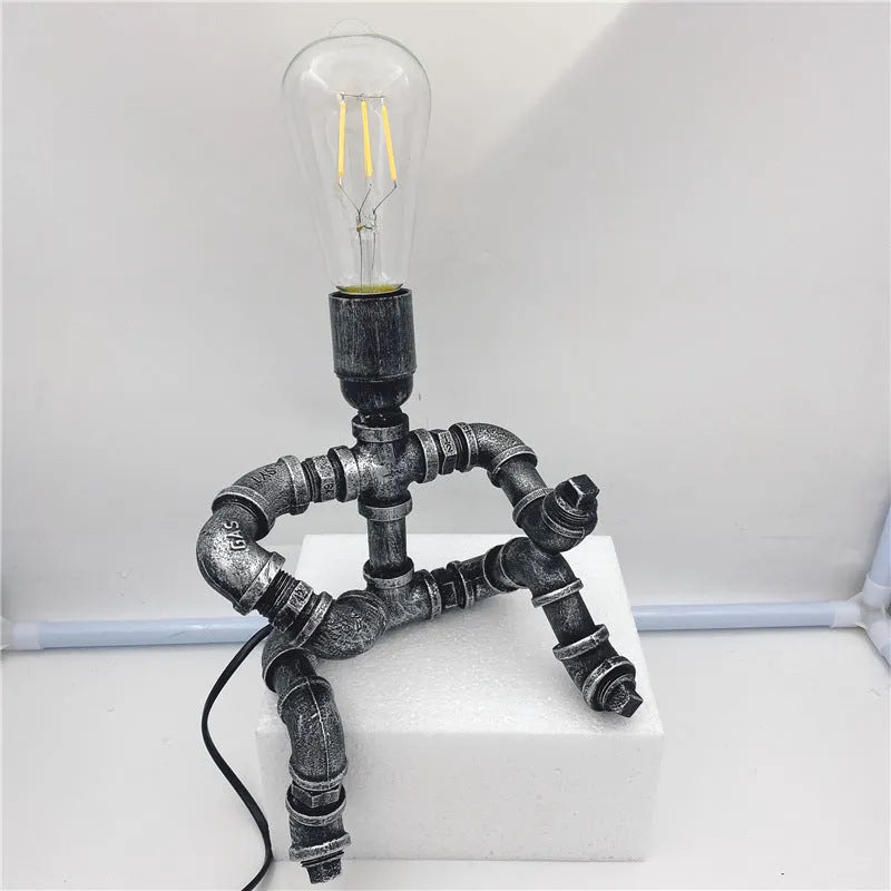 Industrial retro style table lamp made from iron pipes in retro colour with multiple design variations