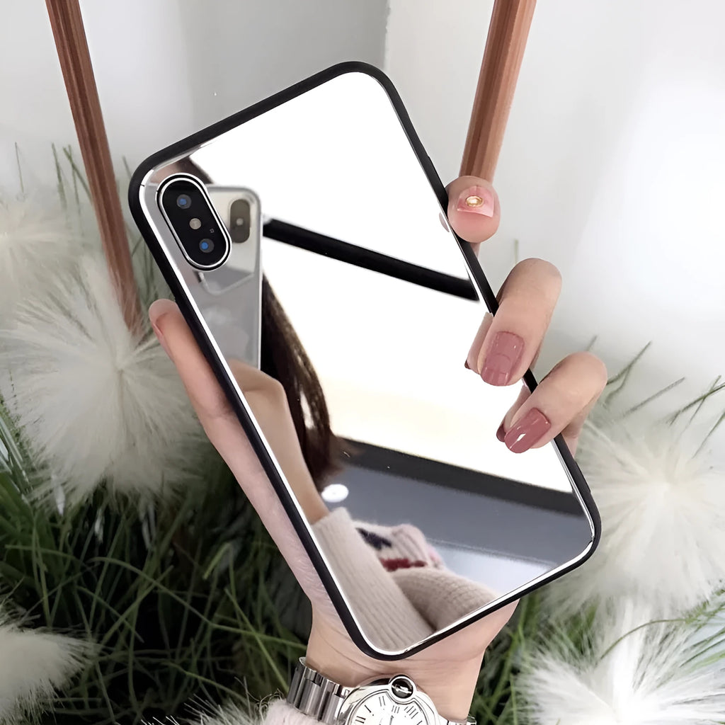 Black iPhone case with a built-in mirror on the back, compatible with iPhone X and iPhone 7 Plus models.