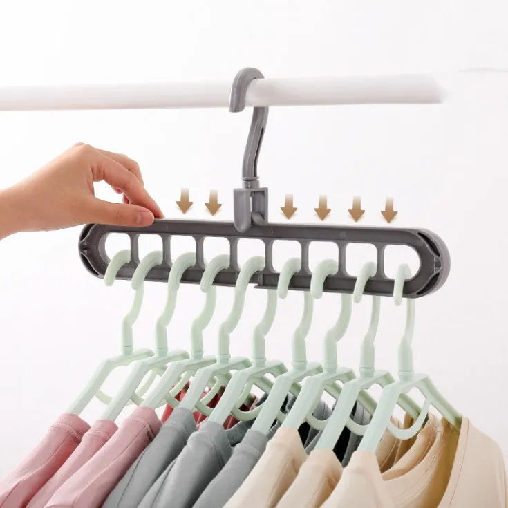 Plastic clothes storage hanger with rotating hook, shown in available colours.