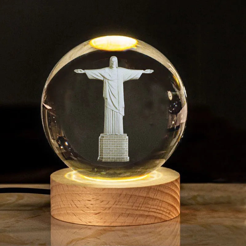 White crystal cross ornament with 6cm ball on wooden warm light base