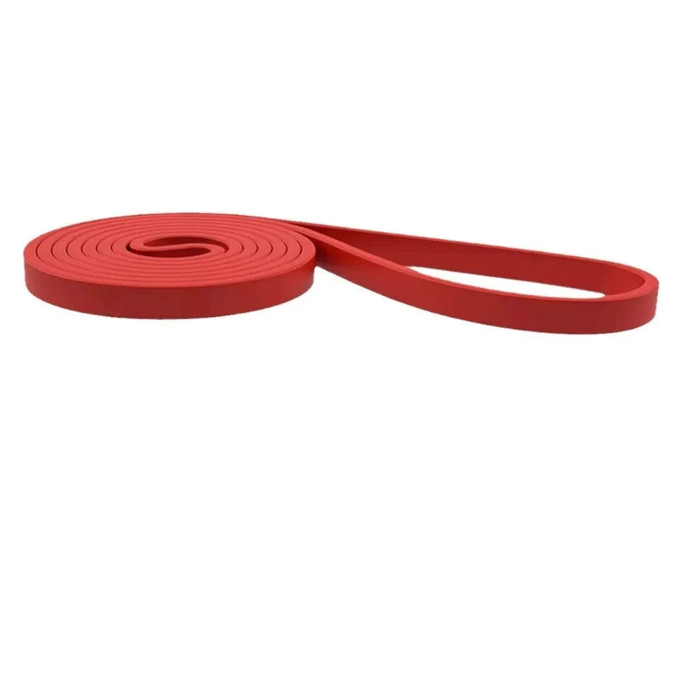 Set of five TPE resistance bands in yellow, red, black, purple, and green for home gym strength training.