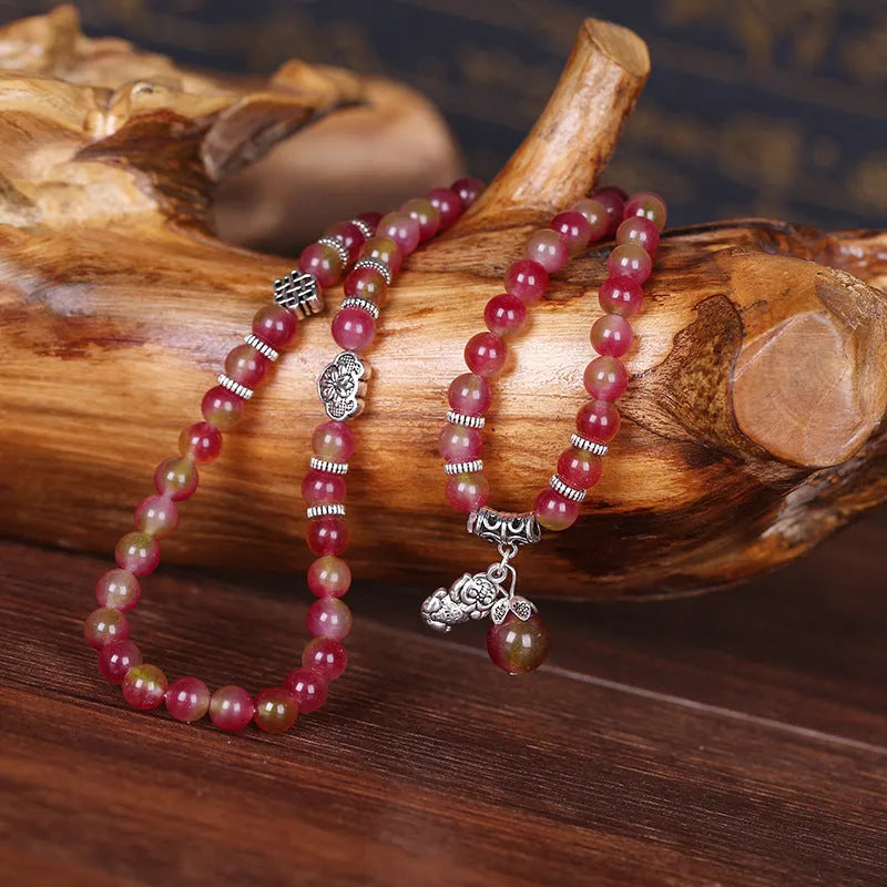 Natural watermelon crystal bracelet with Chinese knot design in 6mm and 8mm bead sizes