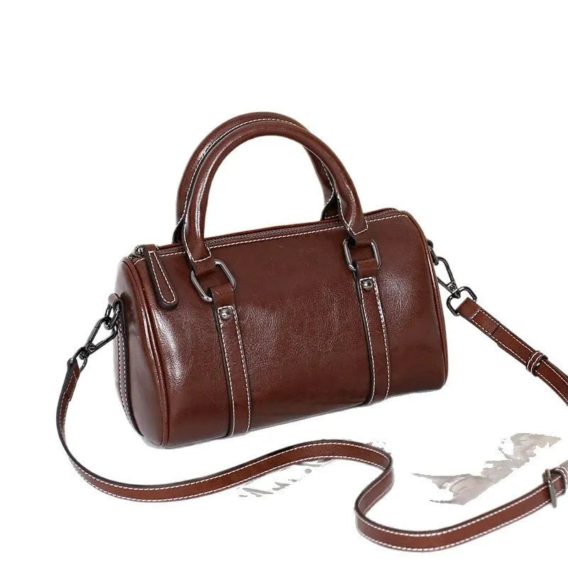 Cortex Lady casual zip crossbody bag in top grain leather, cylindrical shape, patchwork, available in caramel colour