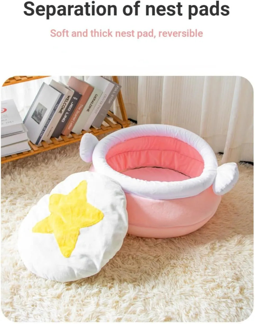 Pink honey pot-shaped cat bed with magic wand design and a soft, removable inner cushion.