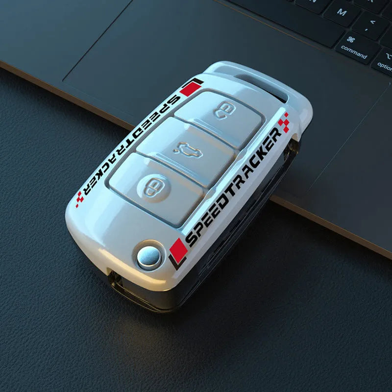Carbon fibre style car key cover with mirror element in carbon and white colour options